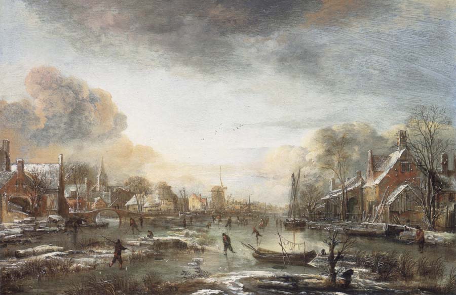 A Frozen River by a Town at Evening